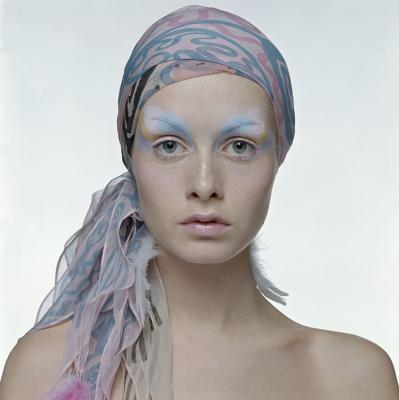 English model Twiggy wearing an eye shadow in matching pastel shades, 1970s