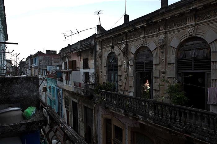 She Is Cuba  ,Havana crumbling aritecture 