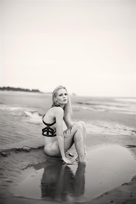 The Beach ,sun sand and ---